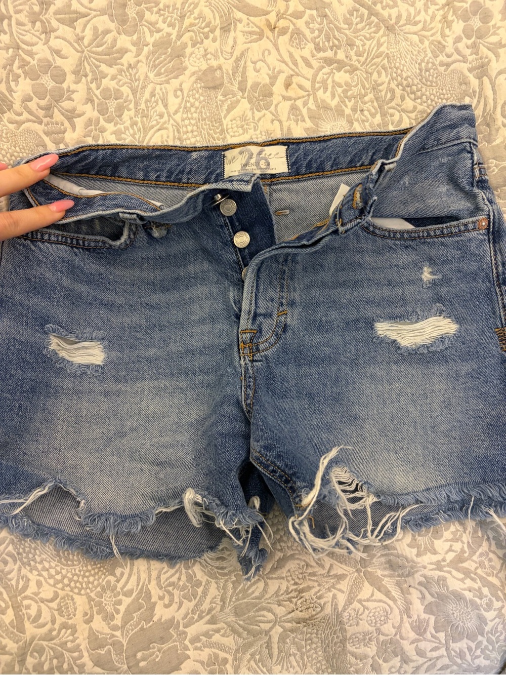 Free People Medium Blue Distressed Denim Shorts, Gap floral, Levi yellow